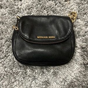 Michael Kors crossbody bag with gold hardware